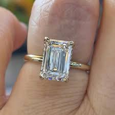 Emerald cut lab grown diamond showing rectangular step-cut facets and hall-of-mirrors effect